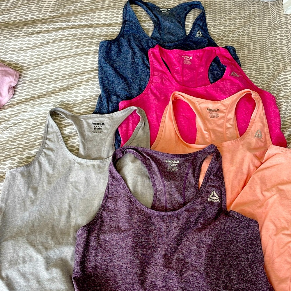 Reebok tanks size small and medium 25.00 for all 5
